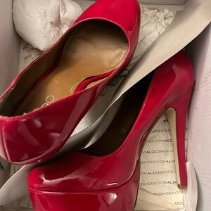 Red patent leather pumps